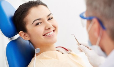 Woman smiling in dental chair