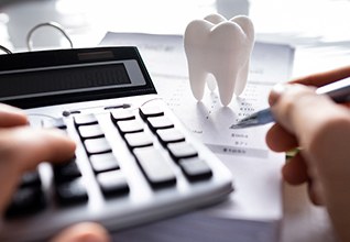  A patient calculating the cost of cosmetic dentistry
