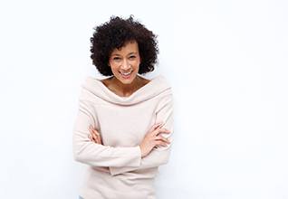 woman smiling with dental implants in Chevy Chase