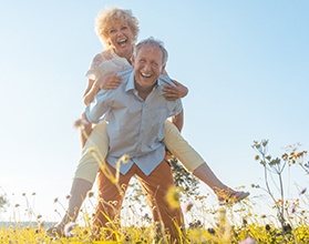 patients enjoying the health benefits of dental implants in Chevy Chase