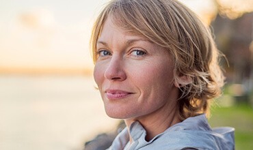 Female patient smiling at sunset