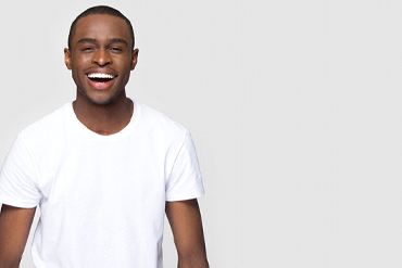 person smiling against a white background