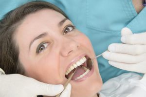 Woman smiling during dental checkup