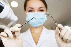 Dentist holding instruments