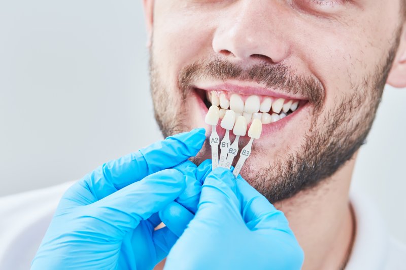 A man undergoing cosmetic dental treatments